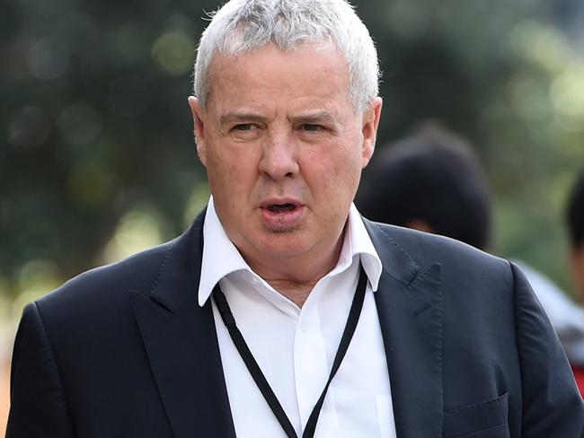 Australian Olympic Committee media Director Mike Tancred,  arrive to address the media in Sydney, Tuesday, June 21, 2016. Australian Paralympian Liesl Tesch and a team physiotherapist were robbed of their bicycles at gunpoint in Rio de Janeiro yesterday.  (AAP Image/Dan Himbrechts) NO ARCHIVING