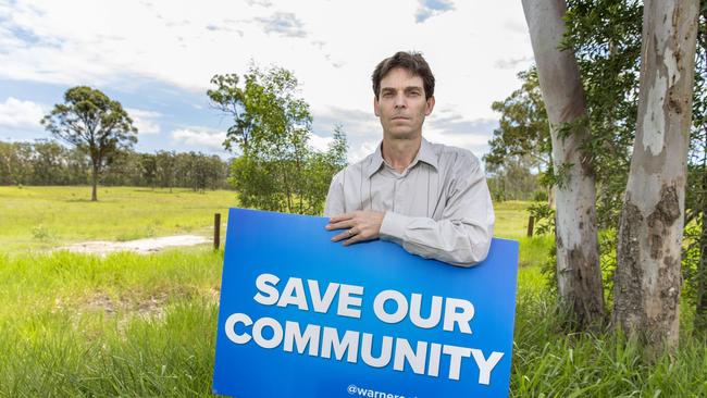 Warwick Mendham from community group opposing major development at Warner in 2017. (AAP/Richard Walker)