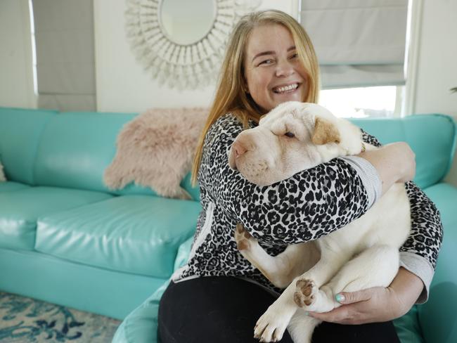 Four month old Shar Pei Luna with foster carer Tracey Mitchell, who was rescued by Precious Paws. Picture Lachie Millard