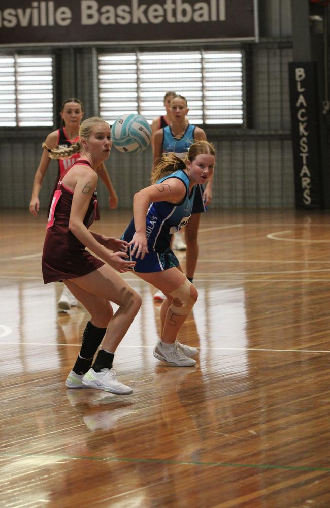 Netball action from QISSN 2024 in Townsville. St Ursula's College v Holy Spirit College