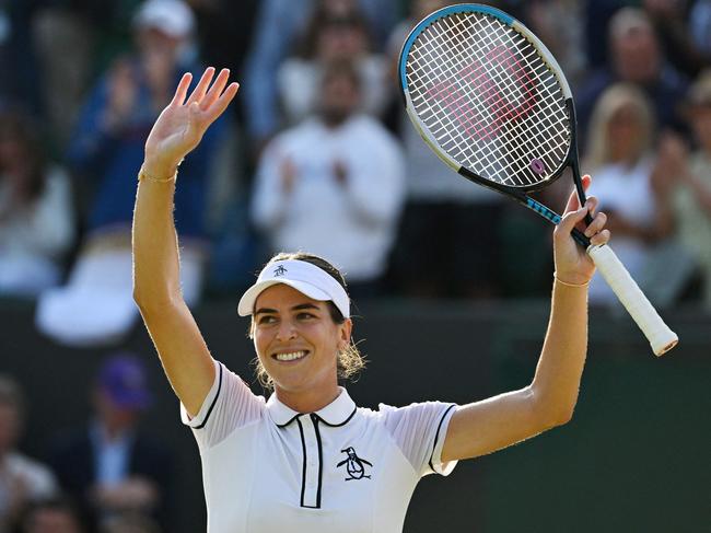 TOPSHOT - Australia's Ajla Tomljanovic celebrates beating France's Alize Cornet during their round of 16 women's singles tennis match on the eighth day of the 2022 Wimbledon Championships at The All England Tennis Club in Wimbledon, southwest London, on July 4, 2022. (Photo by SEBASTIEN BOZON / AFP) / RESTRICTED TO EDITORIAL USE