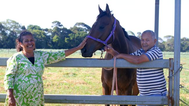 Aloomba trainer Lawrence Reys with artist Susan Reys and gelding Cordon. The cousins are the nephew and niece of Melbourne Cup winning jockey Frank Reys.