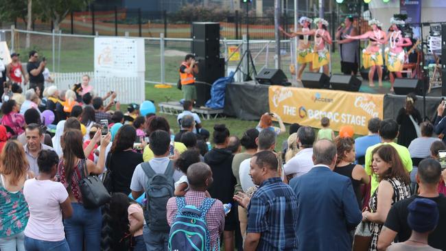 Crowds watch dancing at the Bridging Cultures event.