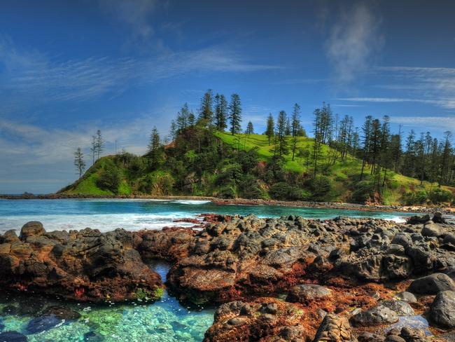 This beautiful coastal location on Norfolk island is called Cresswell bay and is just a minutes walk from Bomboras reserve. Nestled in amongst tall cliffs on both sides with huge Norfolk Pine trees clinging to the slopes it is an idyllic place of volcanic features and rock-pools.question 2escape november 15 2020 doc holiday