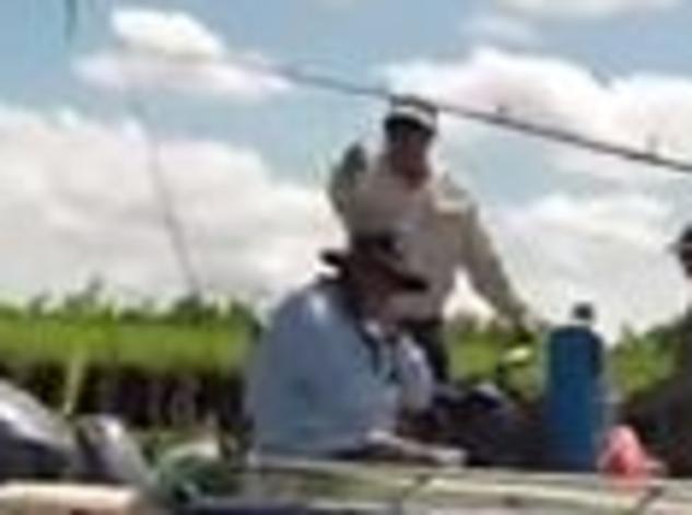 Fishing guide Alan Beale lashes out at fellow guide Mickey Qaiser during a confrontation at Shady Camp. The spat ended with Mr Beal in court on an assault charge and a separate charge of interfering with a commercial fishing vessel. Screen shot taken of a video uploaded to Youtibe.