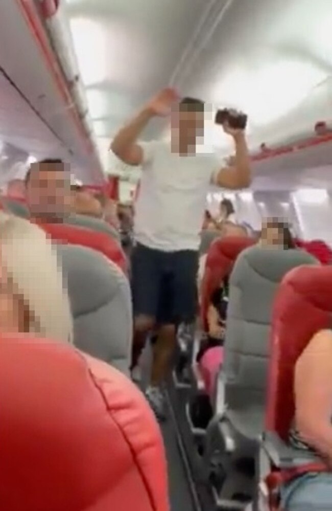 The suspect is taken off the plane that was due to fly to Turkey. Picture: Storyful