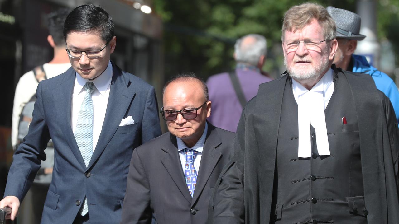 Mr Duong (centre) with his barrister Peter Chadwick KC (right). Picture: NCA NewsWire / David Crosling