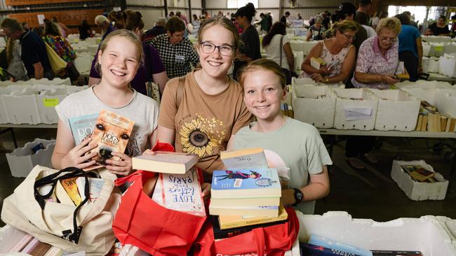 Avid readers (from left) Sally and Emma DeKroon with Hannah De Vries The Chronicle Lifeline Bookfest at Toowoomba Showgrounds, Saturday, March 1, 2025. Picture: Kevin Farmer