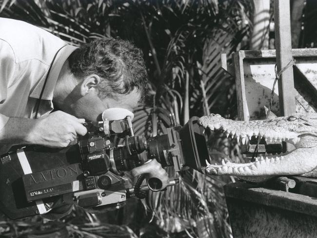 Russell Galvin from Yorkshire Television films a saltwater crocodile at Crocodylus Park for a 10-part documentary series to be aired on the Discovery channel.