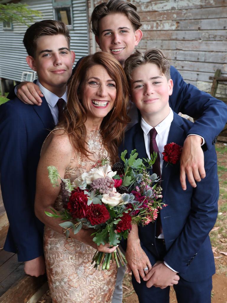 Robin Bailey with her sons at the wedding. Picture: Liam Kidston.