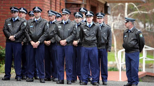 The police force turned out in numbers to pay their respects to the victims and support Walsh’s daughter.