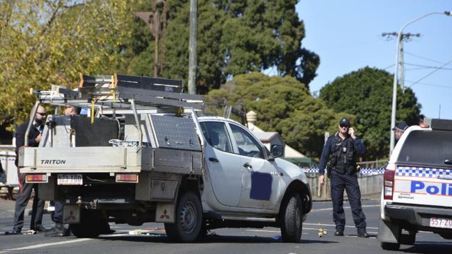 The ute, after the men were arrested at the corner of West Street and O'Quinn Street.