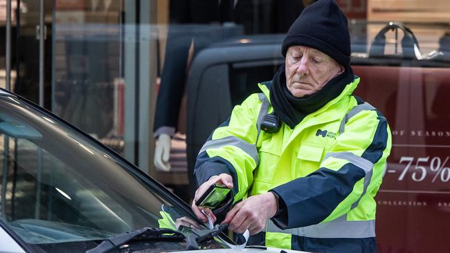 Parking inspectors working in the CBD. Picture: Jason Edwards