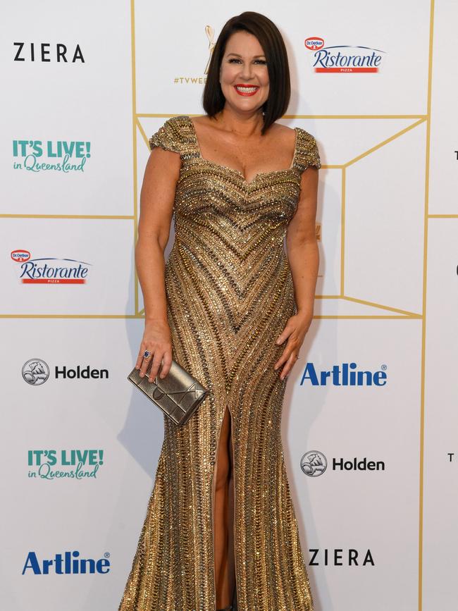 Australia’s funny woman Julia Morris stuns in an eye-catching, sparkly gold number. Picture: AAP