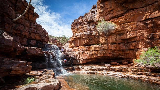 Among the normally dry East MacDonnell Ranges when following the Chain of Ponds walk is the John Hayes Rockhole. Xaver Carroll- kid doing the high leap- 9 years old and Felix Carroll both from Alice Springs Local.