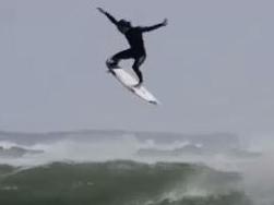 Surfer defies laws of gravity