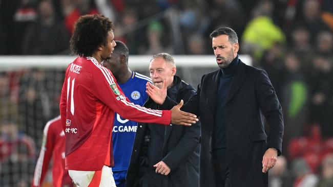 Ruud van Nistelrooy, Interim Head Coach of Manchester United, shakes hands with Joshua Zirkzee. (Photo by Michael Regan/Getty Images)