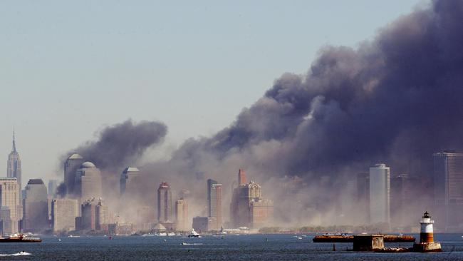 Smoke billows into New York after the twin towers collapsed in Manhattan.