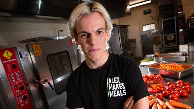 Alex Dekker was a full time uni student when COVID-19 hit and what started as him making meals for his sister, a doctor run off her feet during the pandemic, grew into a charity to now supplies up to 5000 meals a week to the needy. Picture: Tony Gough