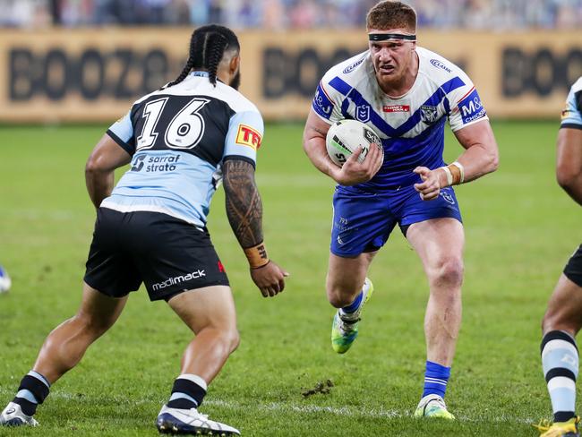 Dylan Napa of the Bulldogs in possession. Picture: AAP Image/David Neilson