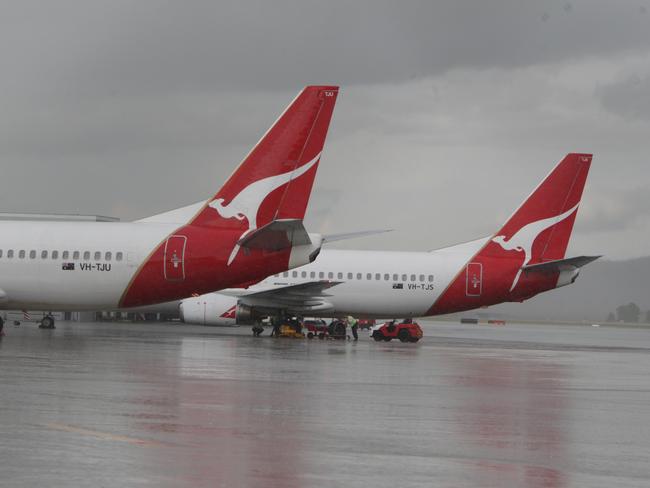 planes at Canberra Airport after Qantas CEO Alan Joyce grounded entire fleet.