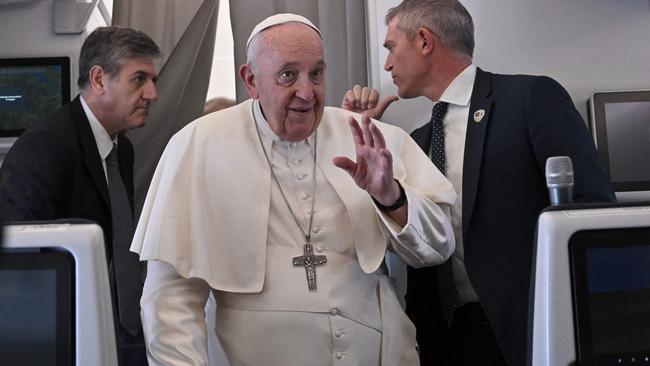 Pope Francis speaks to the media on the flight from Juba to Rome on Sunday. Picture: AFP