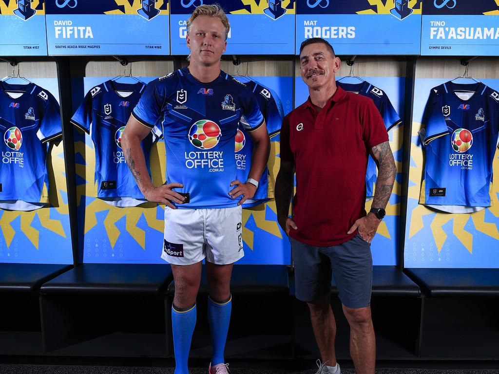 Carter Gordon models the Gold Coast Titans 2025 NRL jersey with club legend Mat Rogers. Picture: Adam Head