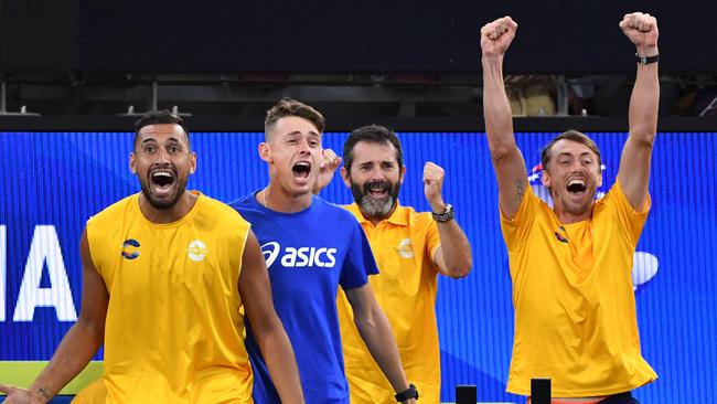 John Millman leads the Aussie cheer squad.