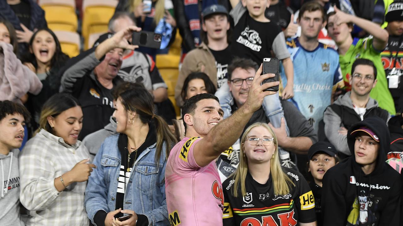 Nathan Cleary delights the Brisbane crowd by taking a selfie last Sunday.