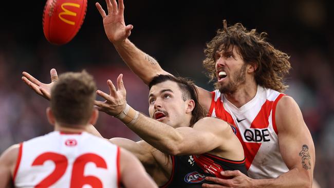 Sam Draper takes the ball in the ruck contest in front of Sydney’s Tom Hickey. Picture: Michael Klein