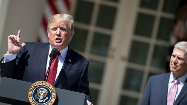 US President Donald Trump speaks before Neil Gorsuch takes the judicial oath during a ceremony in the Rose Garden of the White House April 10, 2017 in Washington, DC. Picture: Brendan Smialowski/AFP