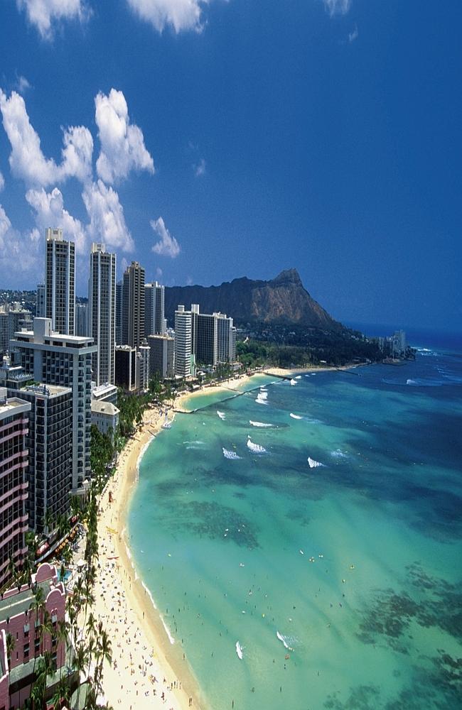 View of famous Waikiki Beach and Diamond Head in Oahu, Hawaii from Ohana Waikiki West hotel. 