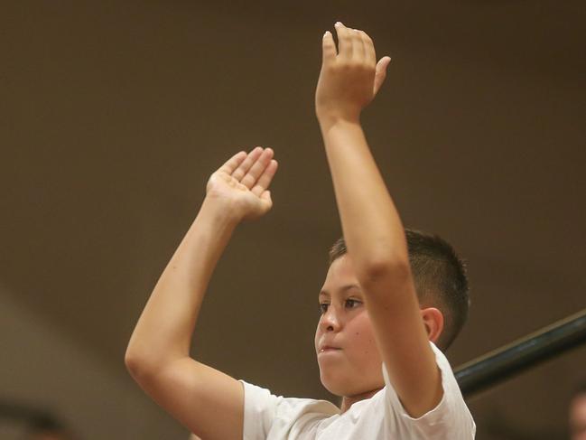 Elijah Lieben claps from the stands at Marrara. Picture: Glenn Campbell.