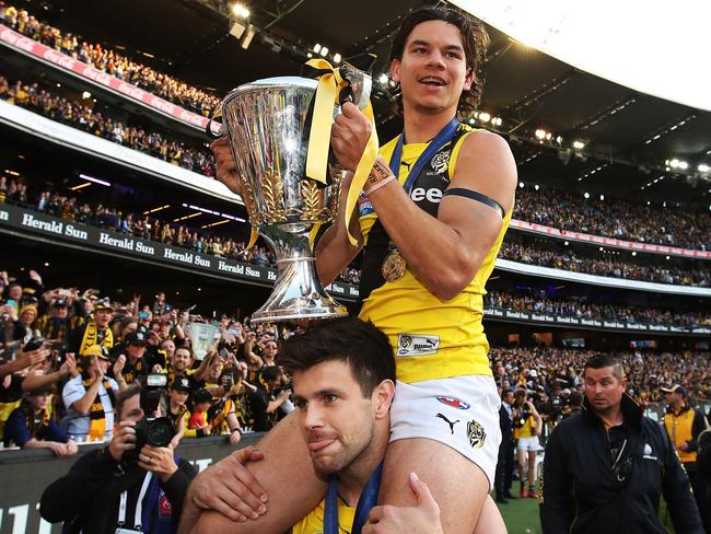 Daniel Rioli had to be carried around after Richmond’s premiership win. Picture: Phil Hillyard