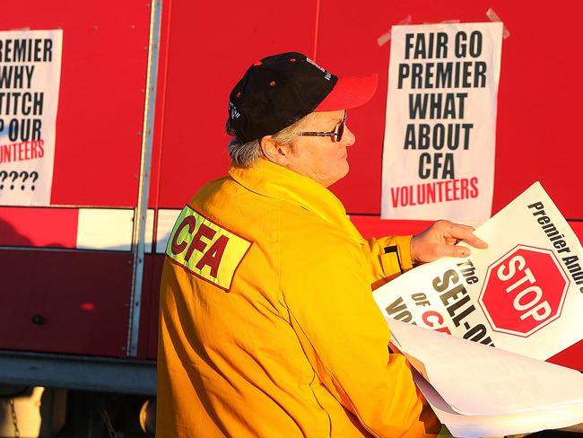 CFA volunteers protest at Ararat Aerodrome waiting for Premier Daniel Andrews to land, but he arrived by car.