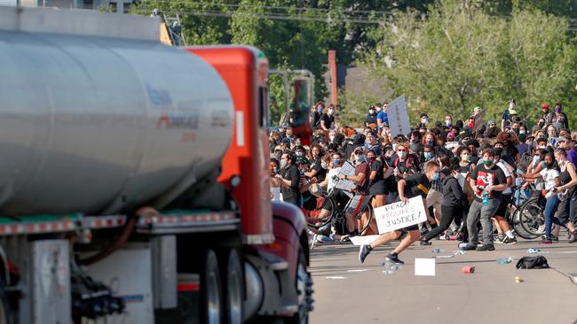 The truck heads towards protesters. Picture: Reuters