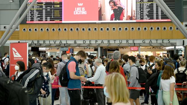 The scenes at the Qantas Domestic terminal at Sydney airport today. Picture: Jeremy Piper