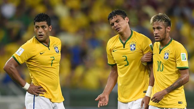 Brazil's forward Hulk (L), Brazil's defender and captain Thiago Silva and Brazil's forward Neymar.