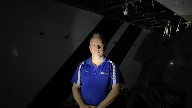 Luke Hepburn, General Manager at Penrith Valley Regional Sports Centre, standing in a recently renovated bathroom that was devastatingly damaged following hail and rainfall over the last week.