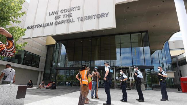 Protesters demonstrated outside the ACT Law Courts while a 30-year-old Victorian man faced charges of arson and destroying Commonwealth property. Picture: NCA NewsWire / Gary Ramage