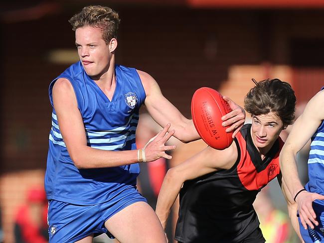 Mitchell Hinge in action for Sacred Heart against Rostrevor this past season. Picture: Stephen Laffer