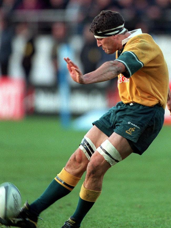 John Eales kicking a winning goal against New Zealand. Credit: Scott Barbour/ALLSPORT