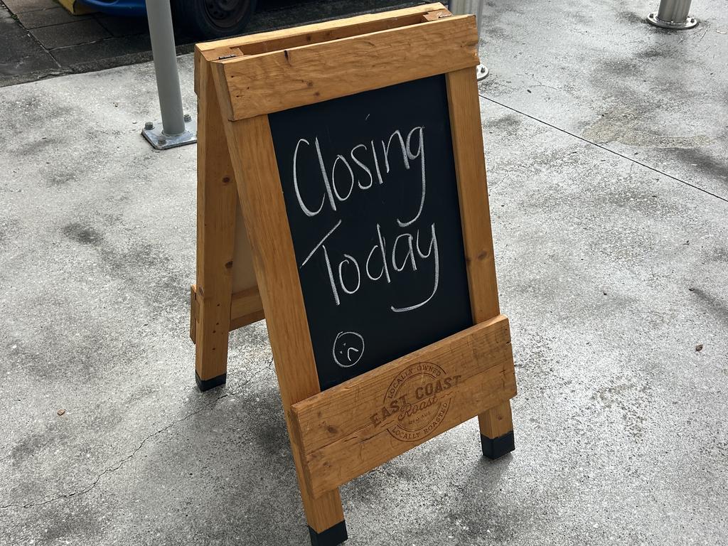 A sign outside the Cuppa Community Cafe in Robina informing customers of its closure.