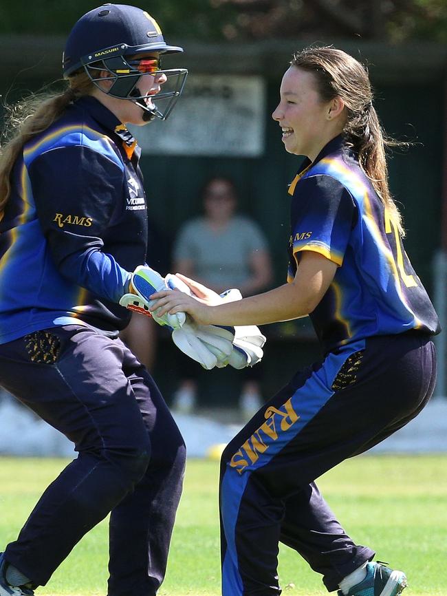 Ringwood’s Caitlyn Parker (right) celebrates a wicket last summer. Picture: Hamish Blair.