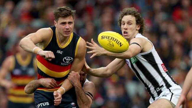 Jake Kelly (left) is getting closer to re-signing with Adelaide. Picture: James Elsby/AFL/Getty Images