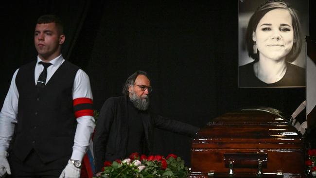 Russian ideologue Alexander Dugin (centre) attends a farewell ceremony for his daughter Darya Dugina. Picture: Kirill Kudryavtsev/AFP