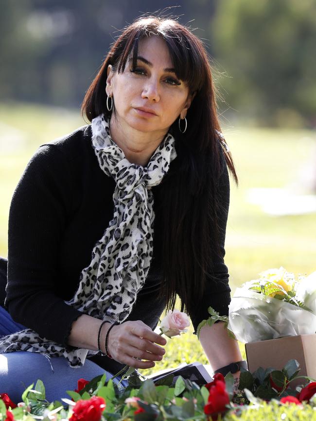 Merna’s mum Tanya Petrus at her daughter’s grave. Picture: Jonathan Ng