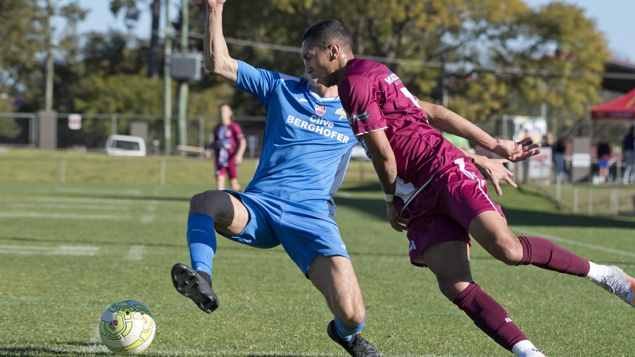 UNDER PRESSURE: SWQ Thunder’s Jordan Tucker (left) closes down Logan Lightning’s Guilherme Santana. Picture: Nev Madsen