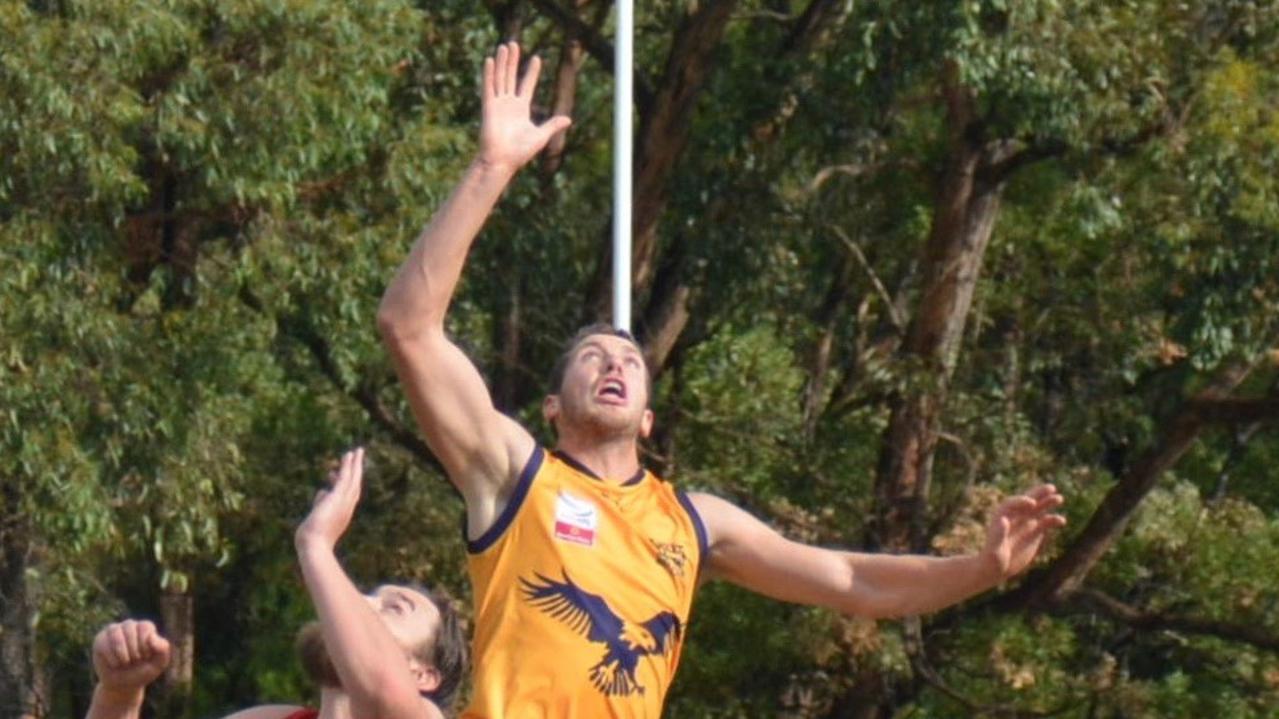 Michael Knoll goes up in the ruck for Vermont last year in the Eastern Football League (EFL).