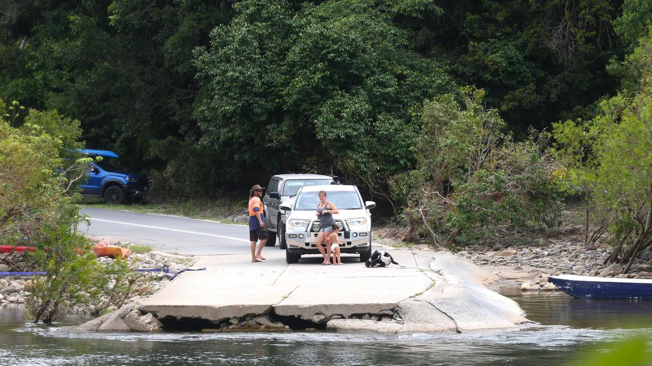 Goldsborough Valley locals wait for school kids to cross the river. Picture: Peter Carruthers